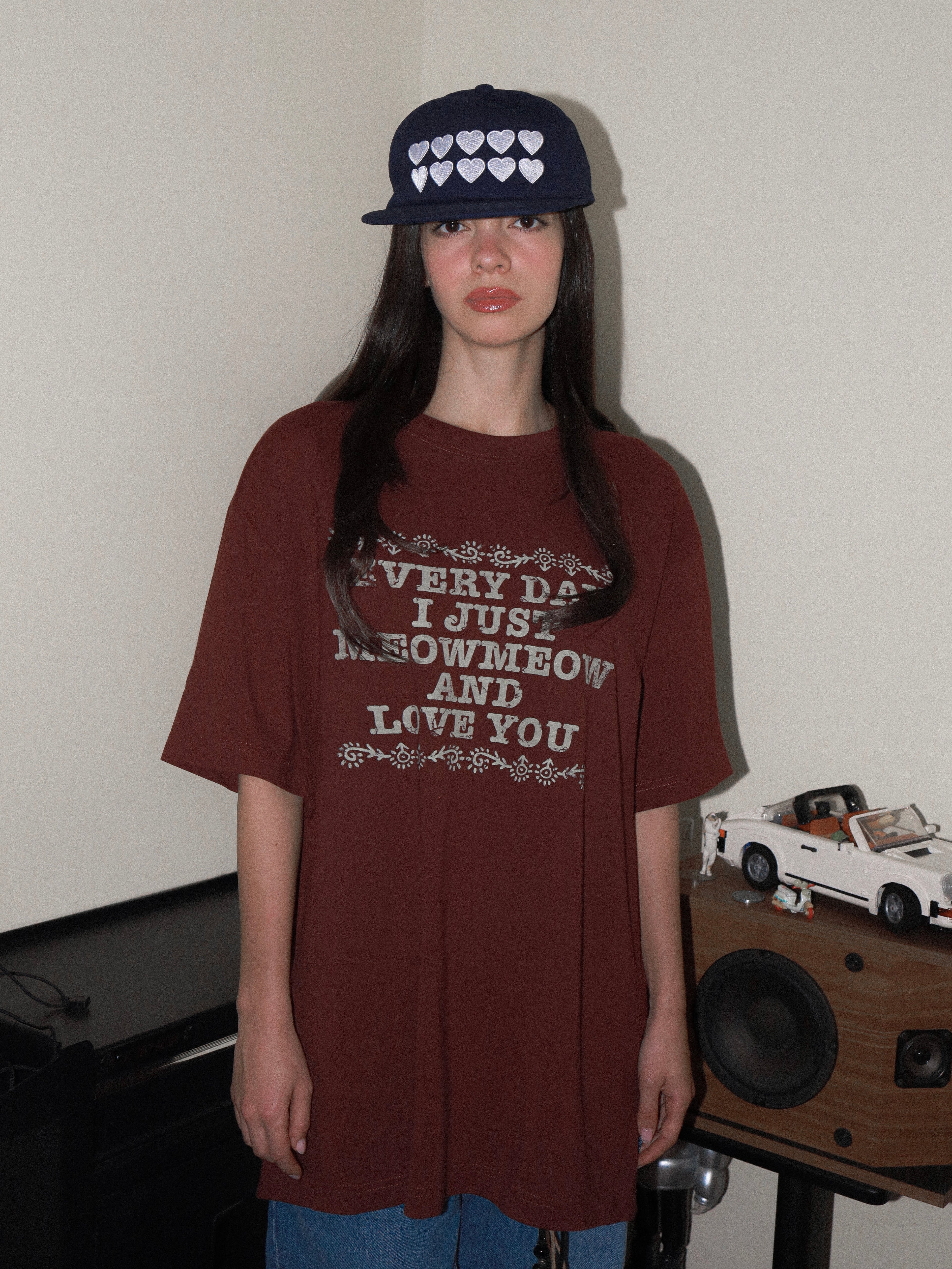 'Every day I just Meow Meow and love you.' Tee Burgundy