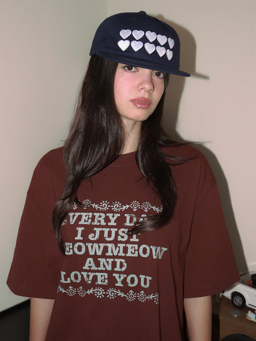 'Every day I just Meow Meow and love you.' Tee Burgundy