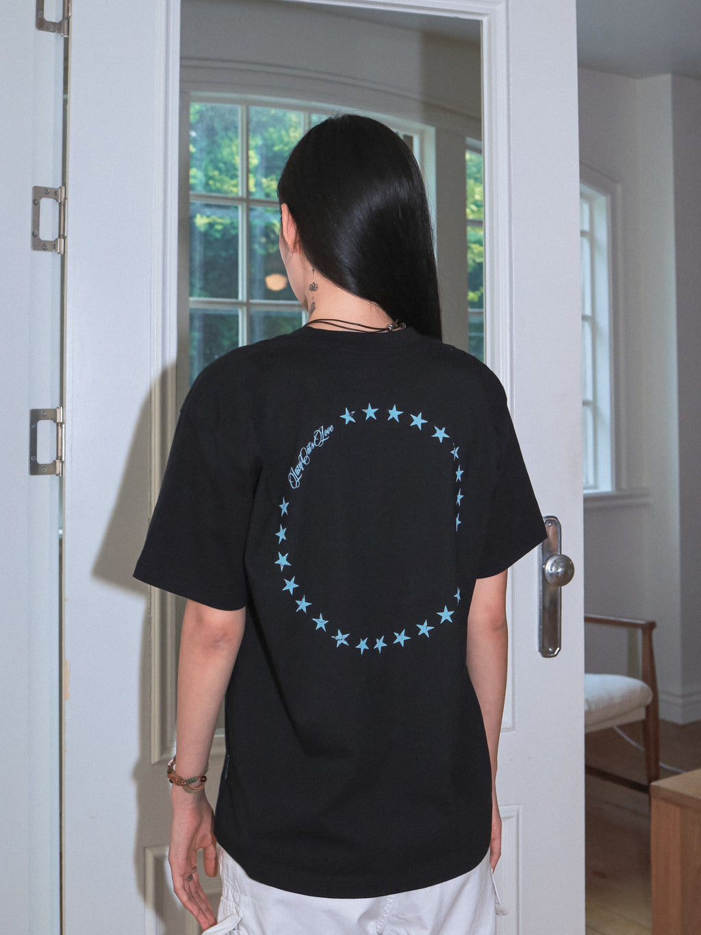 "Stories Linger, Times Can't Erase." Tee Black