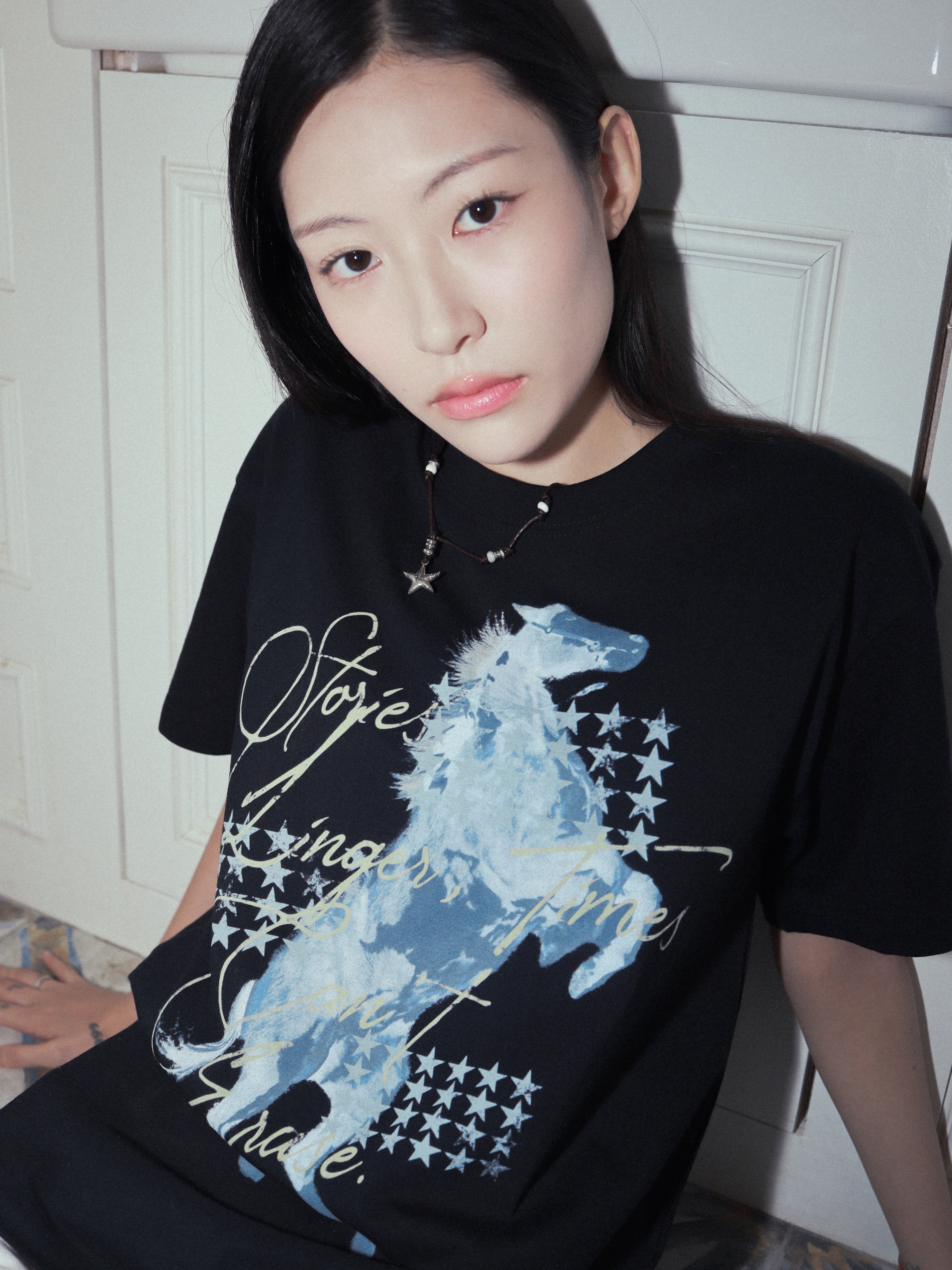 "Stories Linger, Times Can't Erase." Tee Black