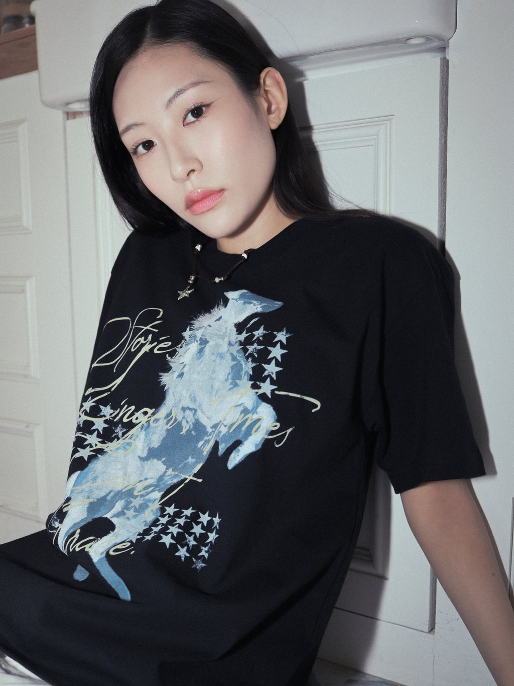 "Stories Linger, Times Can't Erase." Tee Black